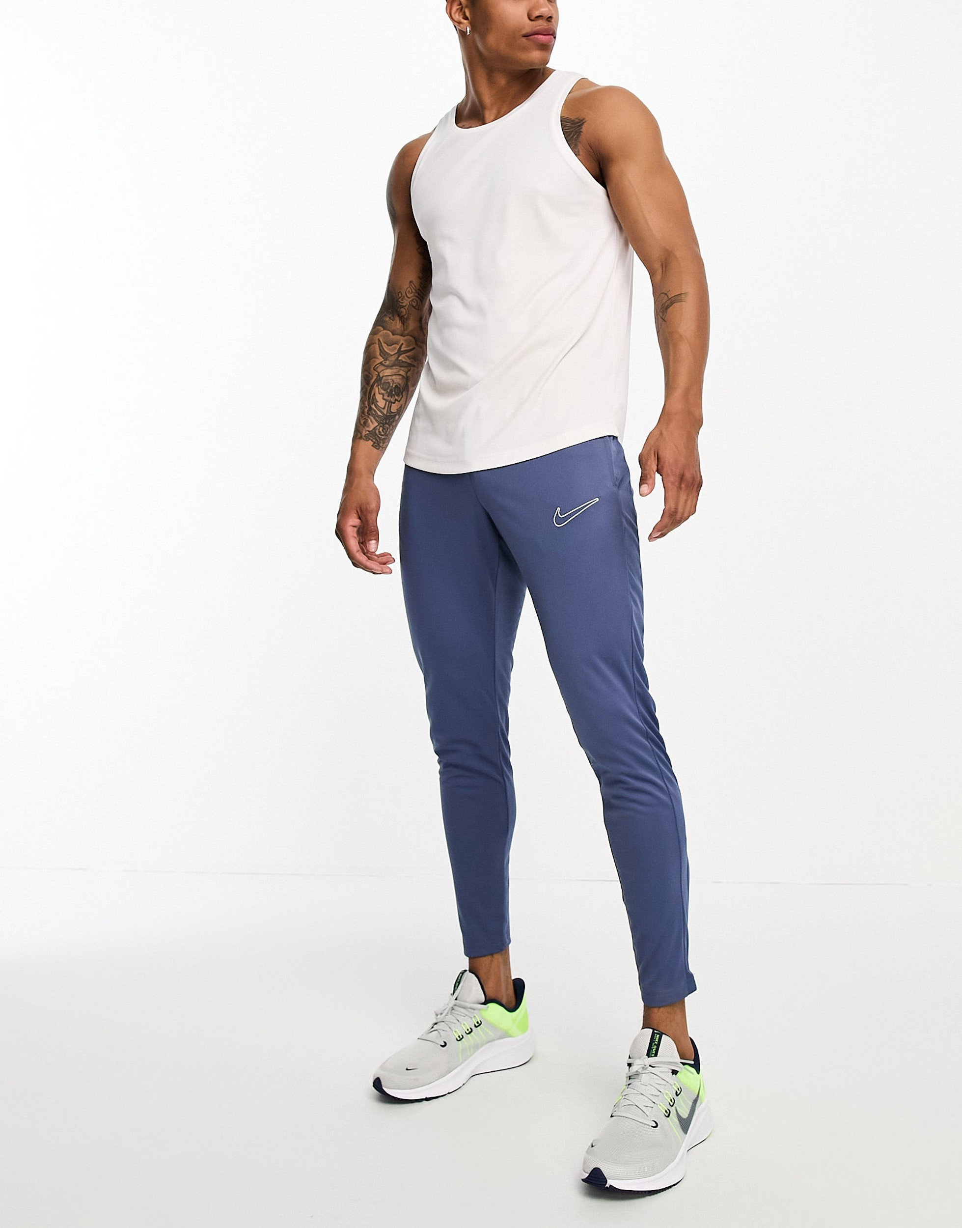 Nike academy track pants blue best sale