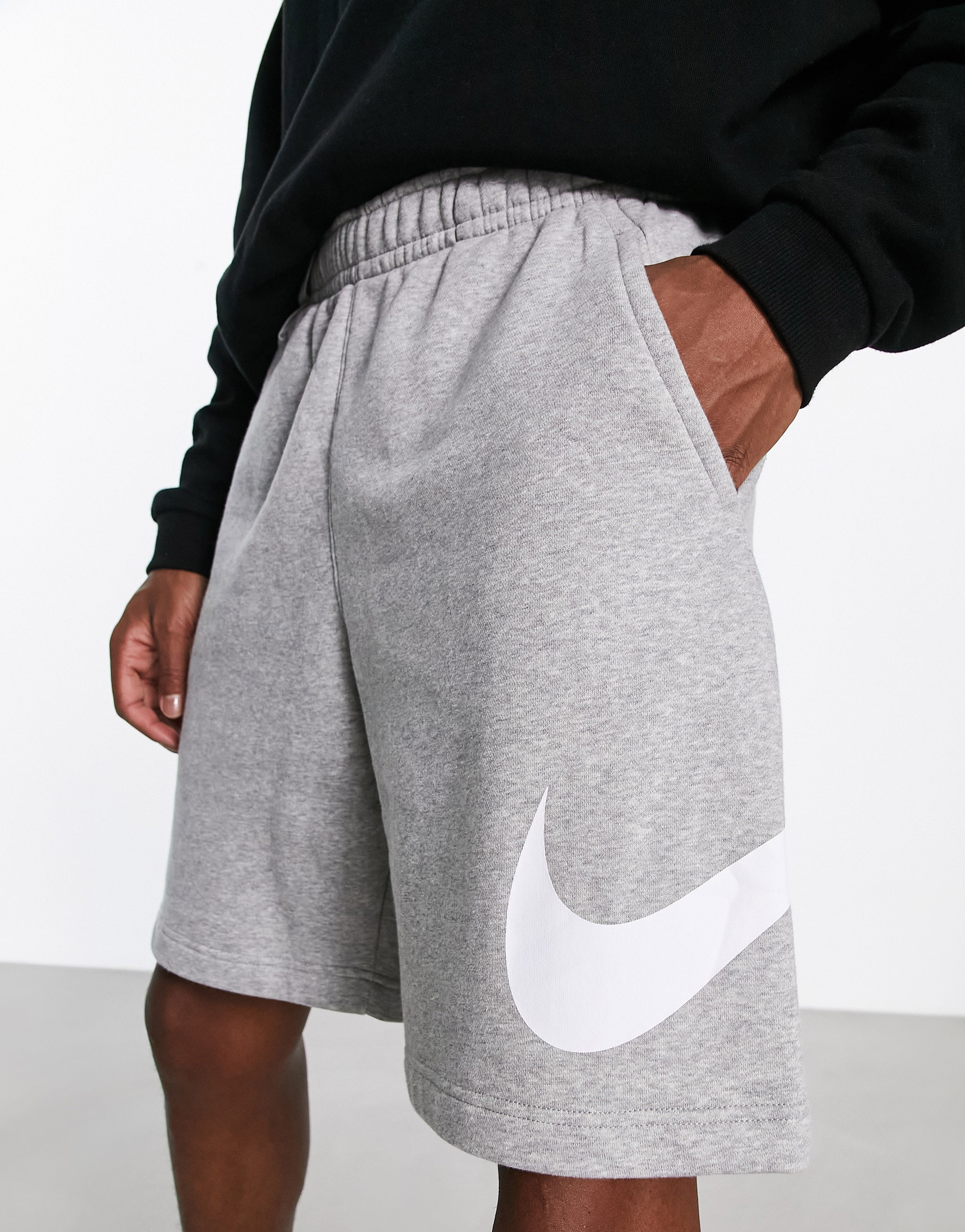 Large swoosh nike shorts on sale