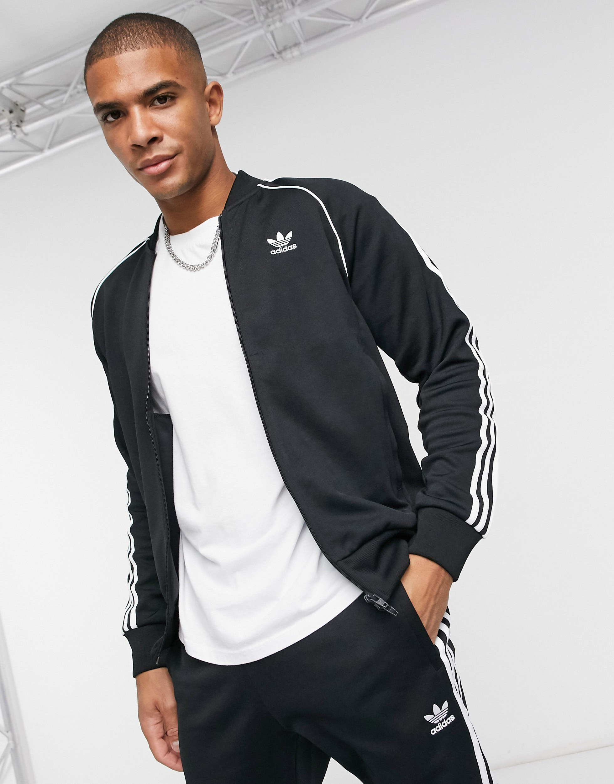 Adidas black superstar sales track jacket