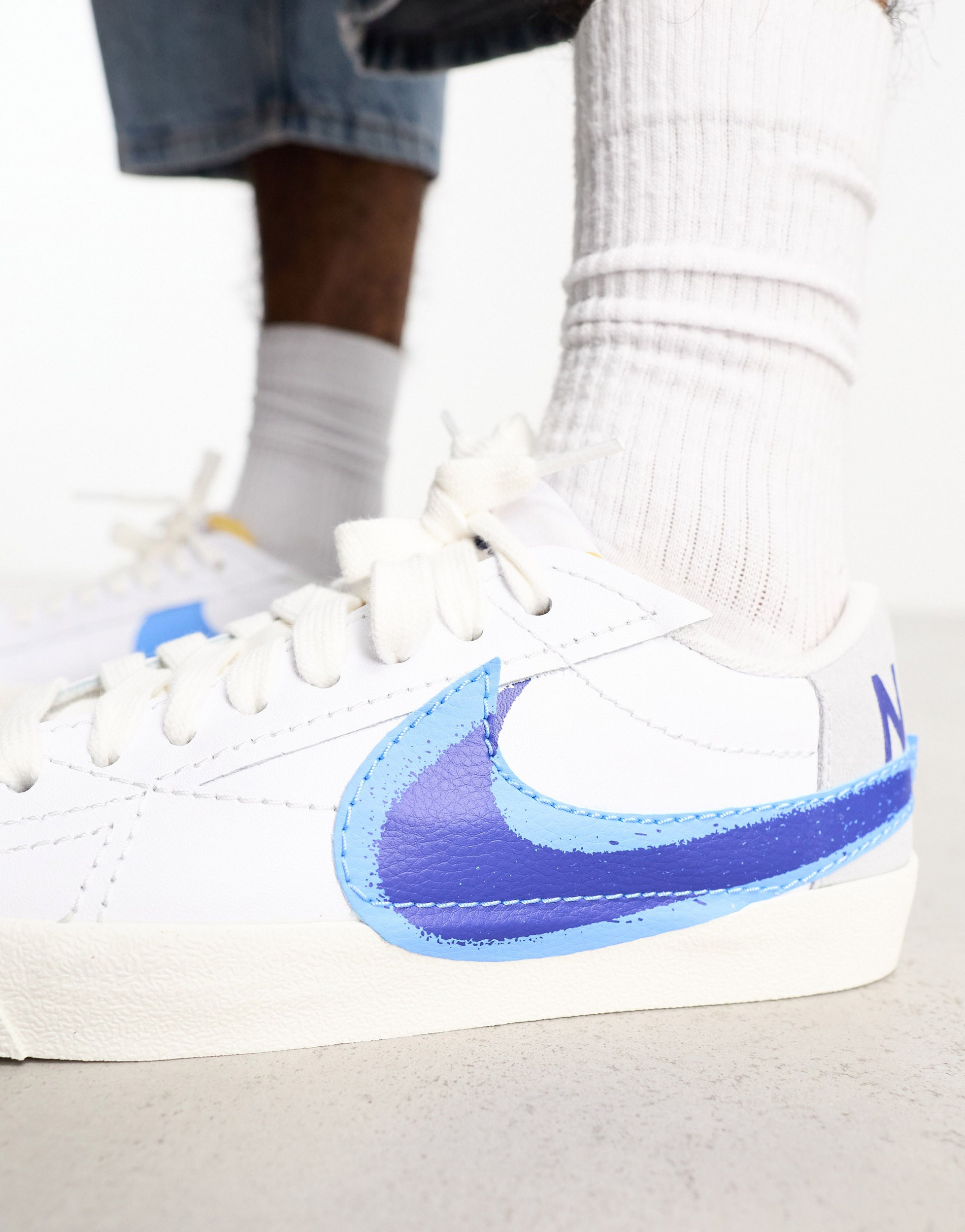 Nike Blazer Low 77 double swoosh spray trainers in white and blue 204078005 Meet Market